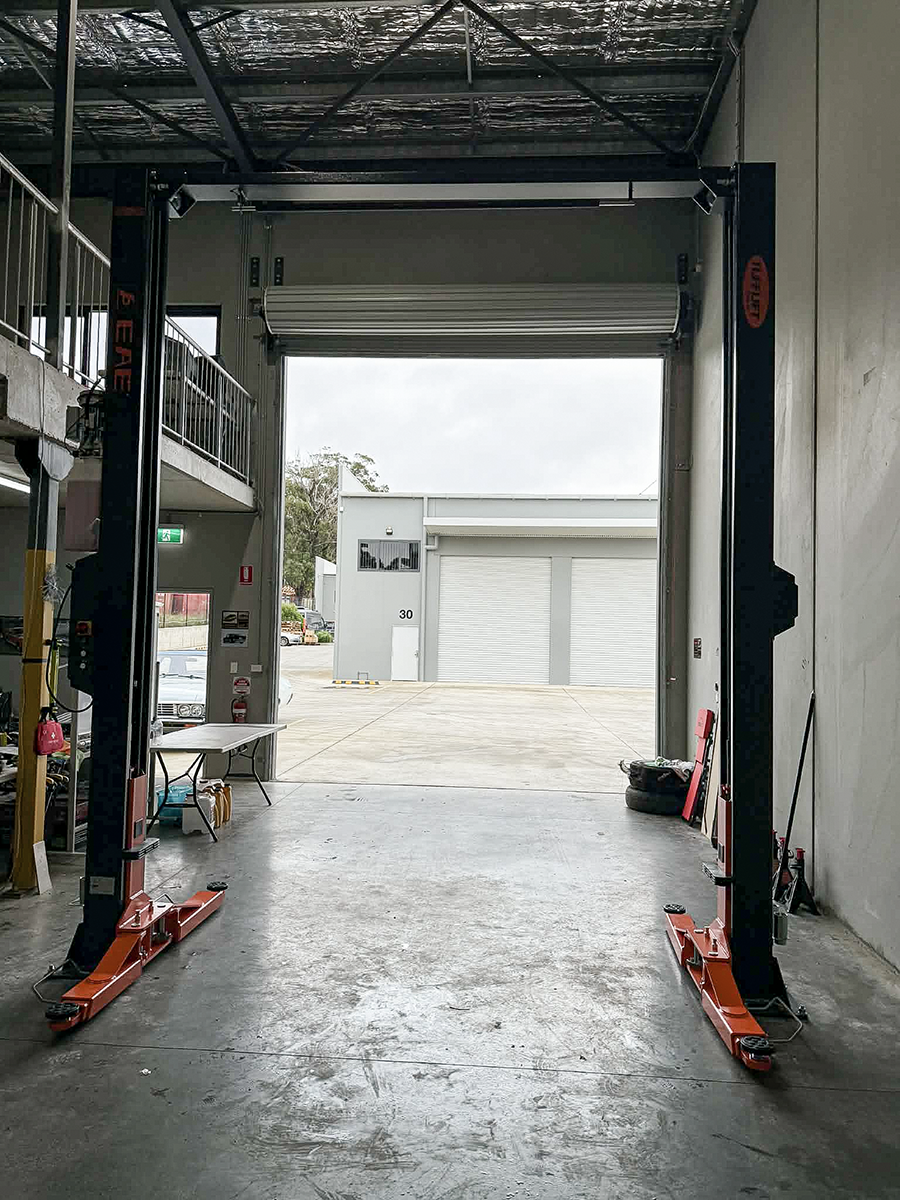 The hoist bay, roller door and working area.